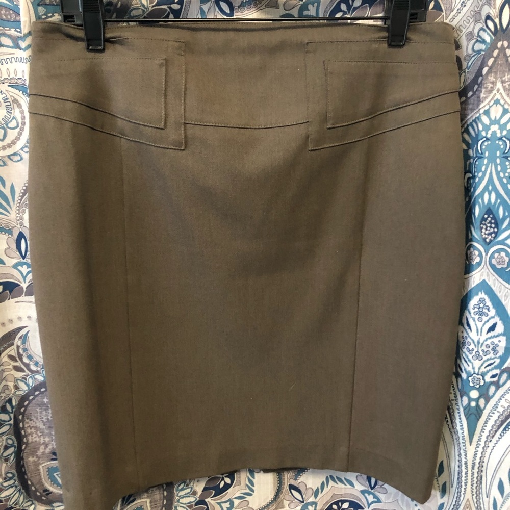 Pencil skirt with back buckle.